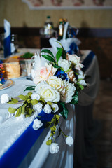 Beautiful flowers at table in wedding day. Floral arrangement on
