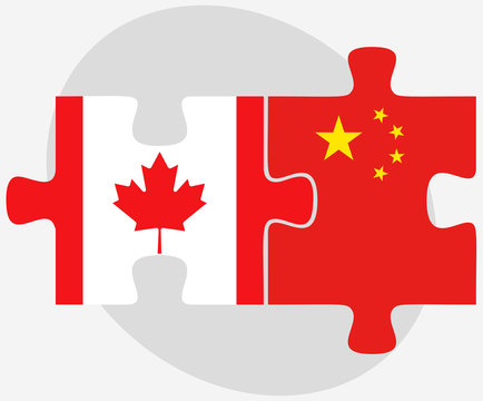 Canada And China Flags In Puzzle