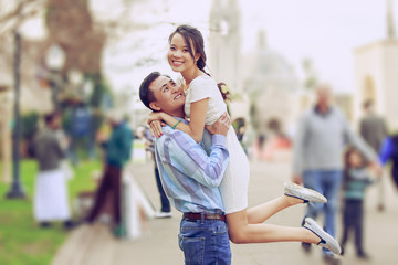 Happy young couple enjoy being outdoor