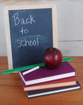 Back to school image of apple and books
