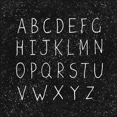 Fototapeta na wymiar Hand-drawn Alphabet on Aged Blackboard Texture