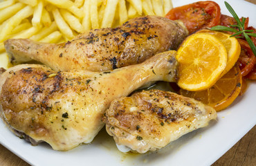 Muslos de pollo asado