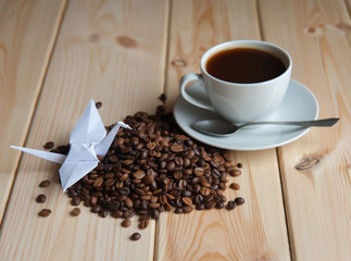 Cup of coffee with crane