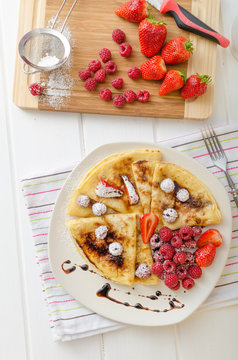 Pancakes with homemade balsamic reduction and fresh fruit