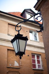 Fototapeta na wymiar Old lantern in Warsaw, Poland