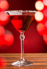 Red cocktail in bar