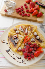 Pancakes with homemade balsamic reduction and fresh fruit