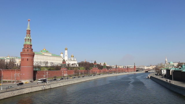 cars driving on Kremlin embankment 