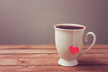 Cup of tea on wooden table. Mother's Day celebration concept