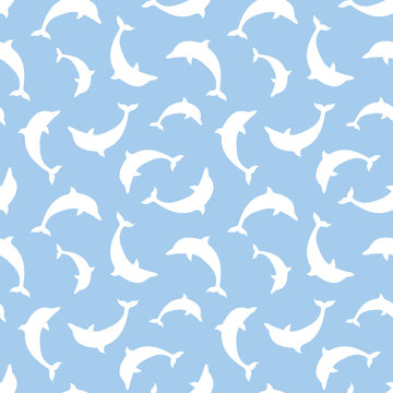 Seamless pattern with dolphins. Vector illustration.