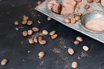Obraz na płótnie Canvas Chocolate truffles in an unusual shape with metal cutlery