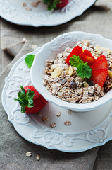 Homemade muesli with strawberry and mint