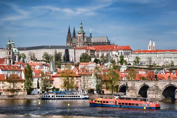 Foto auf Glas Prague Castle with famous Charles Bridge in Czech Republic © Tomas Marek