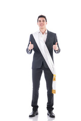 Young elegant man wearing winning ribbon or sash