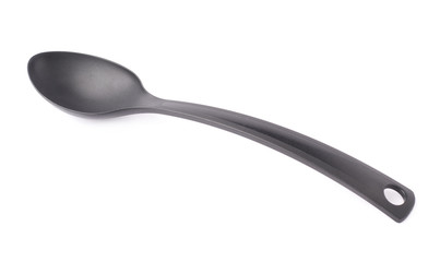Black plastic kitchen ladle spoon isolated