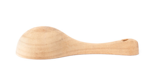 Small wooden measure spoon isolated