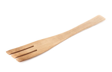 Used wooden fork spatula isolated