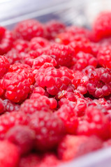 Sweet red raspberries background
