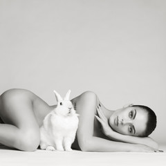 Beautiful woman with rabbit