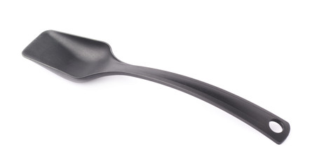 Black plastic kitchen scoop isolated