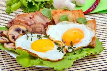 English breakfast -  egg, toast, bacon and vegetables