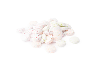 Pile of white breath mint candies isolated