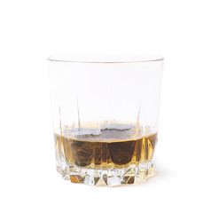Glass tumbler filled with whiskey