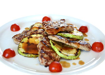 pork tenderloin with zucchini and sauce demi-glace