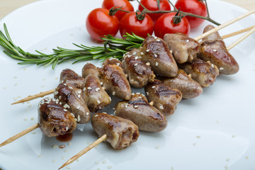 Grilled chicken hearts barbecue
