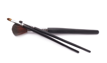 Three different makeup brushes isolated