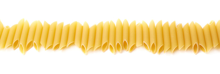 Multiple dried yellow penne pasta