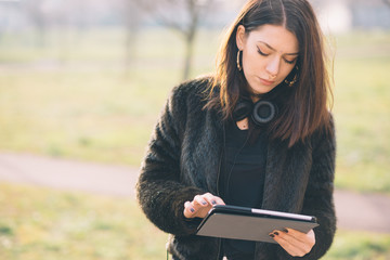 Fototapeta premium young beautiful woman using tablet