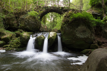 Obraz na płótnie Canvas Waterfall in Mullerthal, also known as Little Switzerland