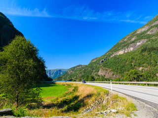 Tourism and travel. Mountains and road in Norway.