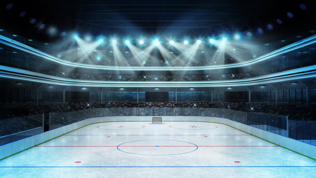 hockey stadium with spectators and an empty ice rink