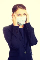 Businesswoman with protecting mask