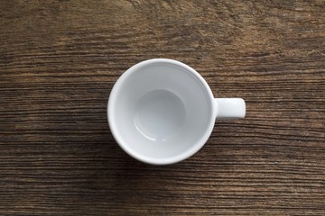 Obraz na płótnie Canvas Empty coffee cup on old wooden