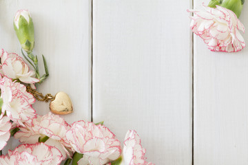 Carnations with Heart Locket from Above