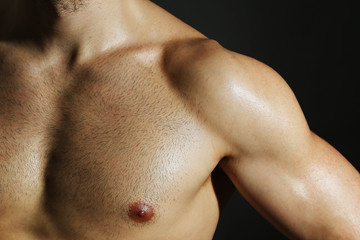 Fototapeta premium Muscle young man close up