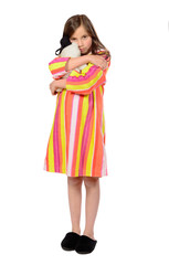 a little girl fondling teddy bear