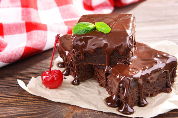 Delicious chocolate cakes on table close-up