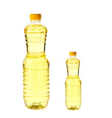 Vegetable oil for cooking in a bottle isolated on white