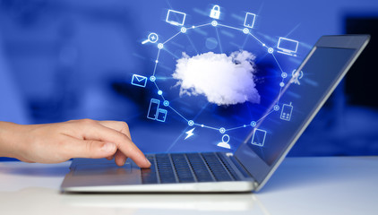 Hand working with a Cloud Computing diagram