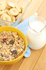 Delicious and healthy cereal in bowl with milk