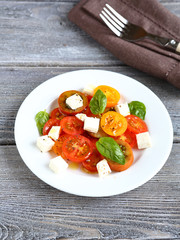 salad with tomatoes and slices of cheese