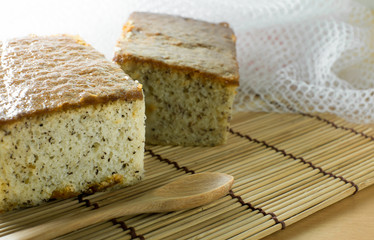 closeup banana cake and orange background,selection focus point