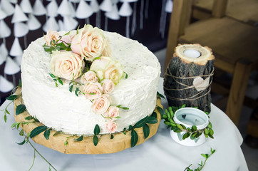 Wedding cake decorated with pink roses