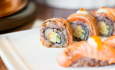 Sushi roll on a plate,selection focus point