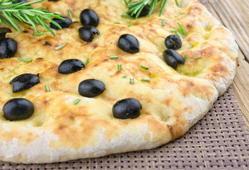 Italian focaccia with olives and rosemary