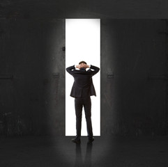 Obraz premium Infinity. Businessman in exit light